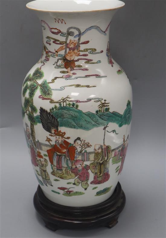 A Chinese famille rose porcelain vase, on hardwood stand overall 42cm